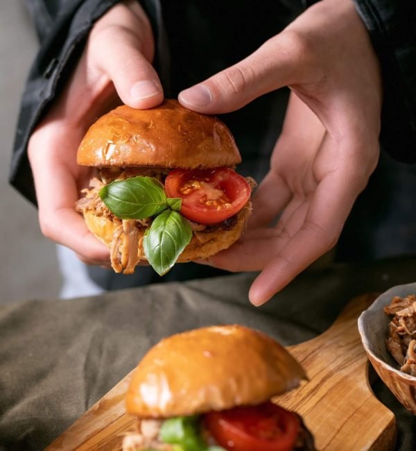 homemade-mini-burgers-with-stew-beef-in-hands-2021-10-13-01-42-27-utc-scaled.jpg